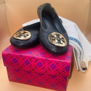 Tory Burch flats with gold emblem, size 6.5
